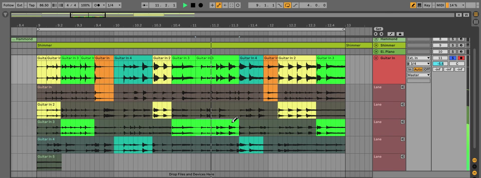 Ableton Live Arrangement View with a main guitar lane assembled from highlighted regions of several take lanes